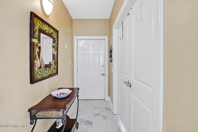 doorway with marble finish floor