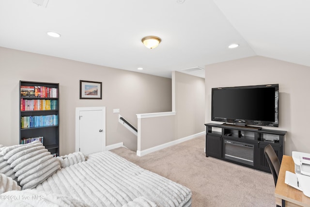 bedroom with vaulted ceiling, recessed lighting, light colored carpet, and baseboards