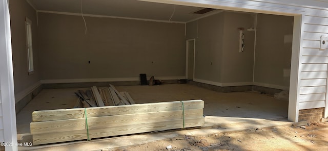 garage with baseboards