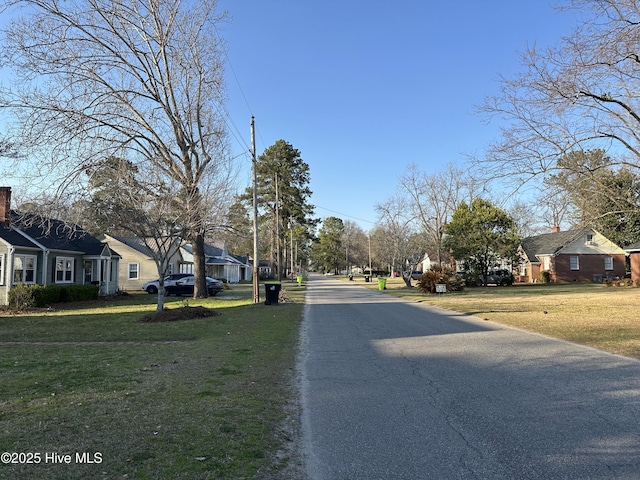 view of road with a residential view