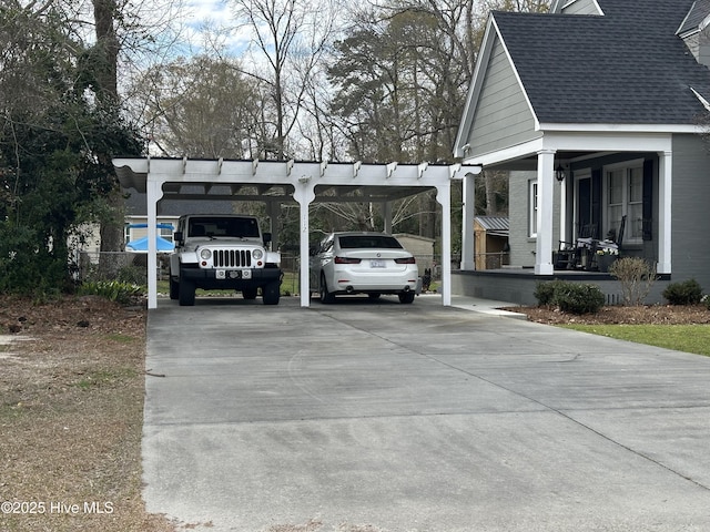 view of car parking with a carport and driveway