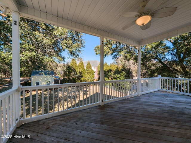 129 Sunset Dr, Cedar Point, NC 28584 - wooden deck with a ceiling fan