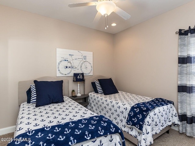 129 Sunset Dr, Cedar Point, NC 28584 - bedroom featuring carpet flooring, baseboards, and ceiling fan
