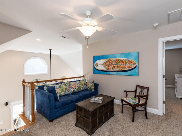 129 Sunset Dr, Cedar Point, NC 28584 - living room featuring visible vents, baseboards, carpet flooring, and vaulted ceiling