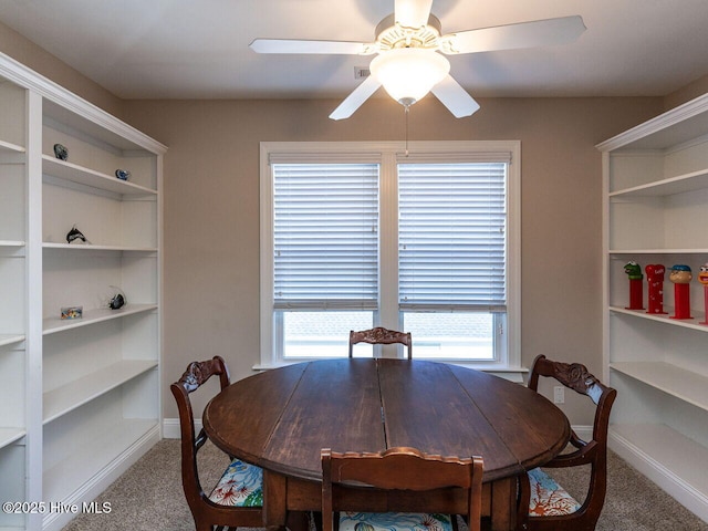 129 Sunset Dr, Cedar Point, NC 28584 - carpeted dining room with a ceiling fan and baseboards