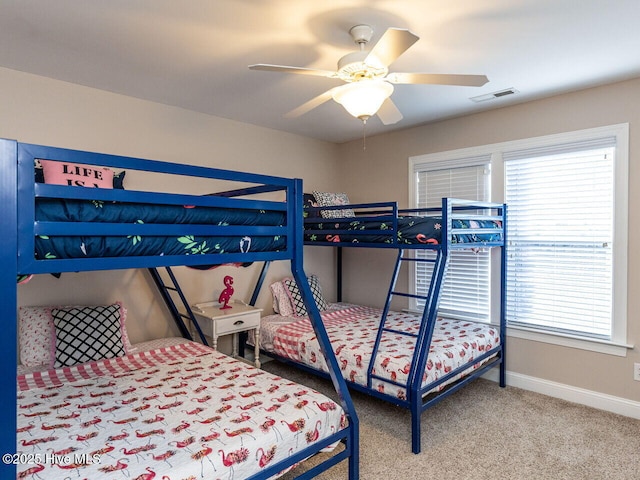 129 Sunset Dr, Cedar Point, NC 28584 - bedroom featuring visible vents, baseboards, carpet, and a ceiling fan