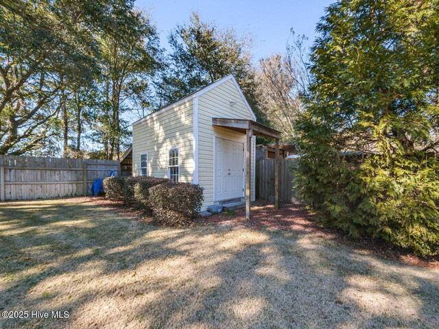 129 Sunset Dr, Cedar Point, NC 28584 - garage with fence