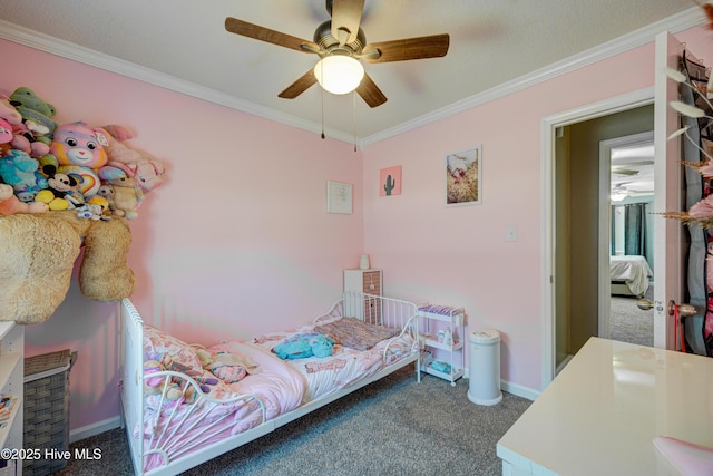 bedroom with ceiling fan, baseboards, crown molding, and carpet