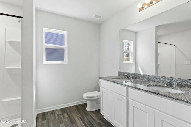full bath featuring visible vents, a shower, and a sink