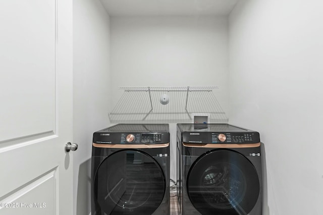 laundry area featuring laundry area and washer and clothes dryer