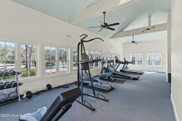 gym with baseboards, high vaulted ceiling, and ceiling fan