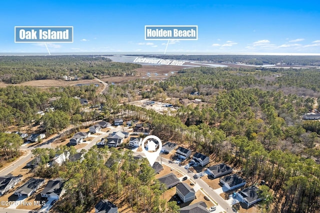 bird's eye view with a forest view