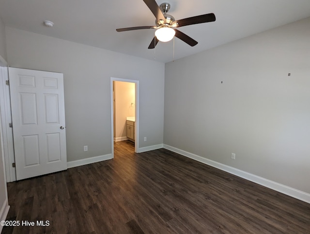 unfurnished bedroom with baseboards, ceiling fan, and dark wood-style flooring