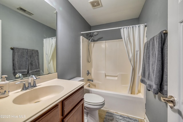 bathroom featuring visible vents, toilet, shower / tub combo with curtain, and vanity