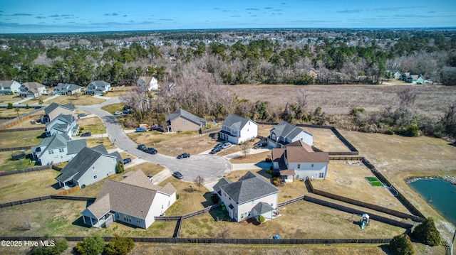 birds eye view of property with a residential view