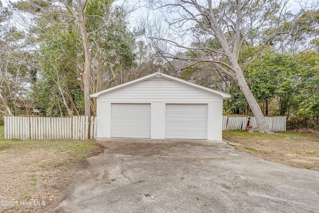 detached garage with fence