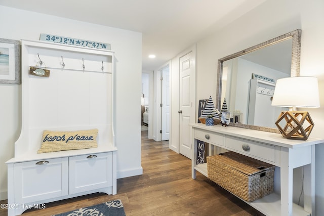 mudroom featuring dark wood finished floors, recessed lighting, and baseboards