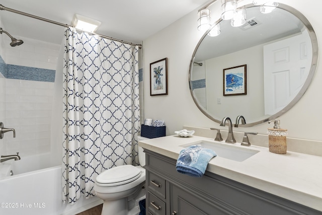 bathroom featuring vanity, shower / bath combination with curtain, toilet, and visible vents