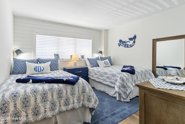 bedroom featuring wood finished floors