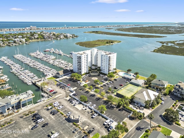 birds eye view of property featuring a water view