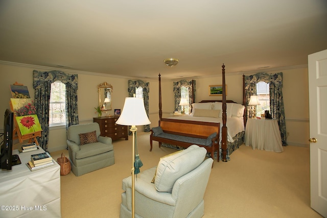 carpeted bedroom featuring ornamental molding