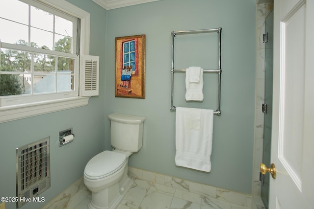 full bathroom featuring baseboards, toilet, heating unit, an enclosed shower, and marble finish floor