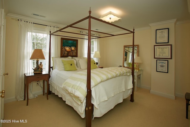 bedroom with crown molding, baseboards, visible vents, and light carpet