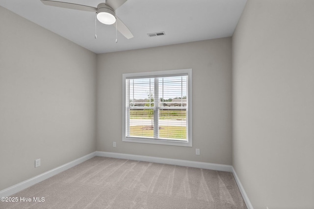 2366 Great Laurel Ct, Greenville, NC 27834 - unfurnished room featuring light colored carpet, baseboards, and a ceiling fan