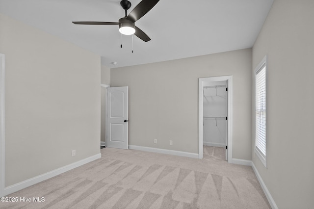 2366 Great Laurel Ct, Greenville, NC 27834 - unfurnished bedroom with carpet floors, a spacious closet, a closet, and baseboards