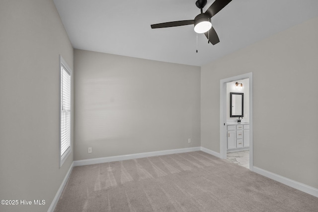 2366 Great Laurel Ct, Greenville, NC 27834 - unfurnished room featuring ceiling fan, healthy amount of natural light, a sink, and light carpet