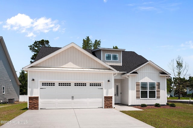 2366 Great Laurel Ct, Greenville, NC 27834 - craftsman inspired home with an attached garage, a shingled roof, driveway, board and batten siding, and stone siding