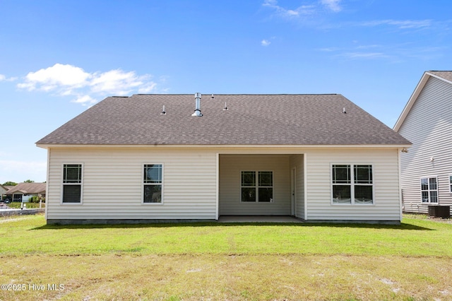 2366 Great Laurel Ct, Greenville, NC 27834 - back of property with central air condition unit, a lawn, roof with shingles, and a patio
