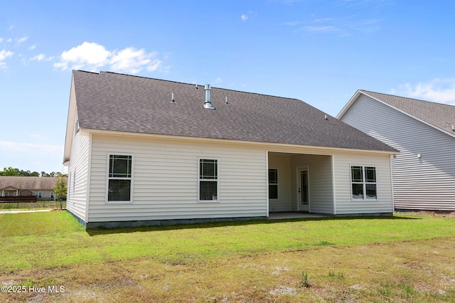 2366 Great Laurel Ct, Greenville, NC 27834 - rear view of property with a yard, a shingled roof, and a patio area