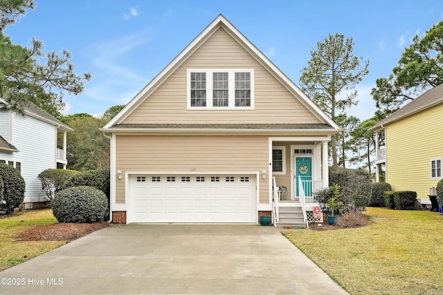 view of front facade with a garage, a front yard, and driveway