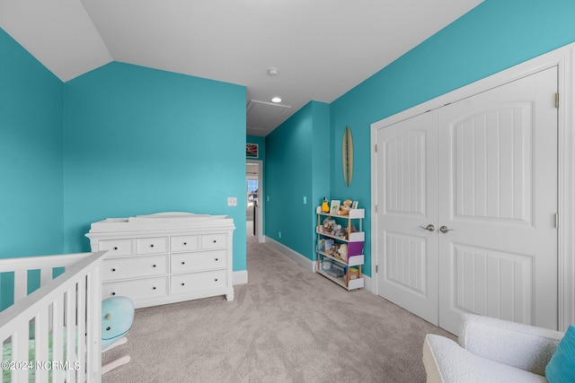 carpeted bedroom with recessed lighting, a closet, baseboards, and vaulted ceiling