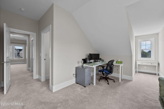 home office with baseboards, carpet, and lofted ceiling