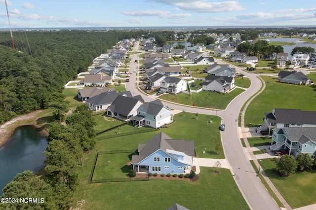 aerial view with a residential view and a water view