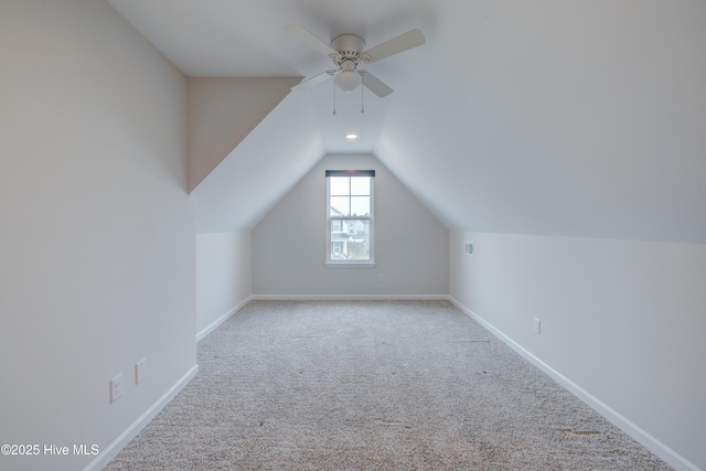 7053 Trailhead Rd, Leland, NC 28451 - additional living space with carpet flooring, a ceiling fan, lofted ceiling, and baseboards