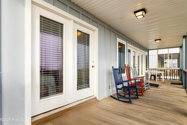 wooden terrace with covered porch