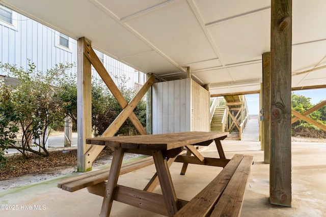 view of patio / terrace with stairs and outdoor dining area