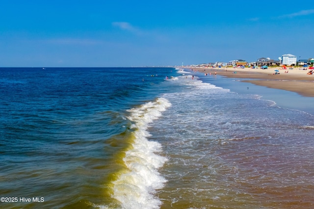 view of water feature with a beach view