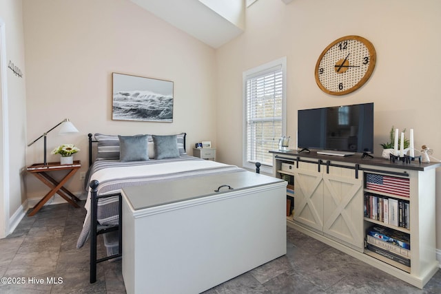 bedroom featuring baseboards