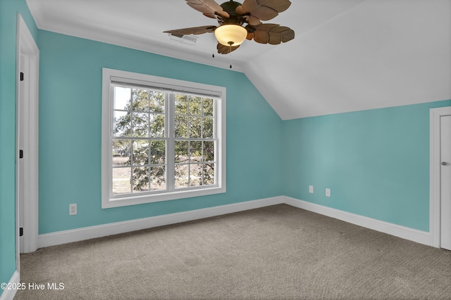 bonus room with lofted ceiling, a healthy amount of sunlight, and carpet flooring