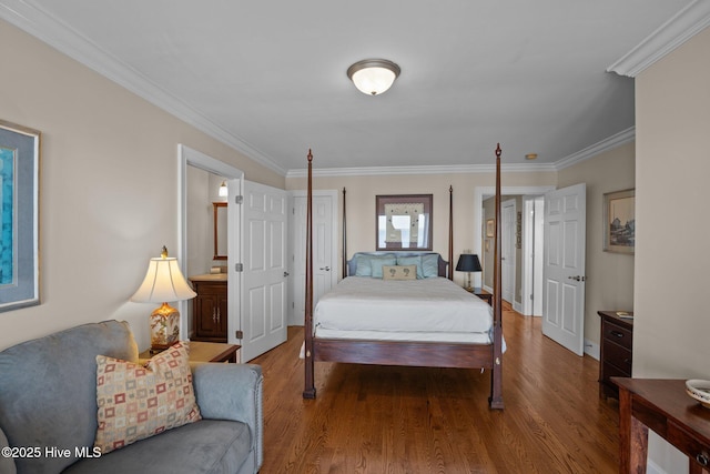 bedroom with wood finished floors and ornamental molding