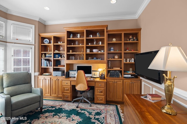 office with recessed lighting, built in desk, and ornamental molding