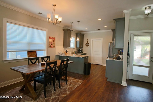 dining area with recessed lighting, dark wood-type flooring, baseboards, and ornamental molding