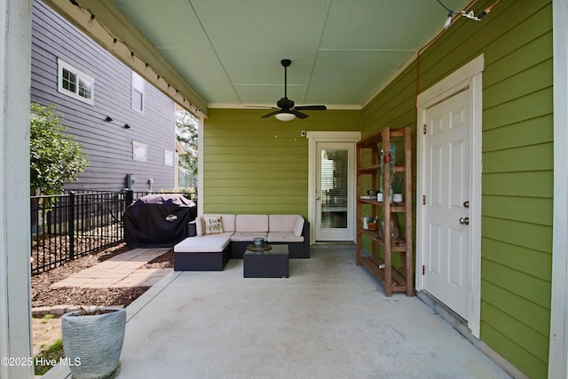 view of patio featuring outdoor lounge area, a ceiling fan, and fence