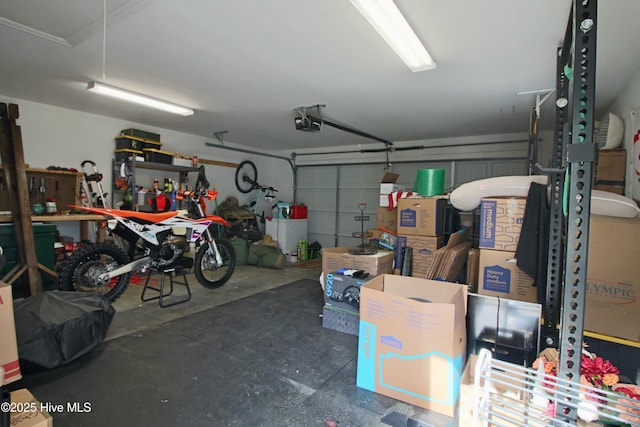 garage featuring a garage door opener