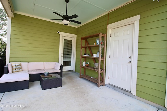 view of patio / terrace with an outdoor living space and ceiling fan