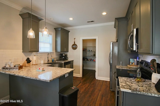 kitchen featuring a sink, light stone countertops, visible vents, and stainless steel appliances